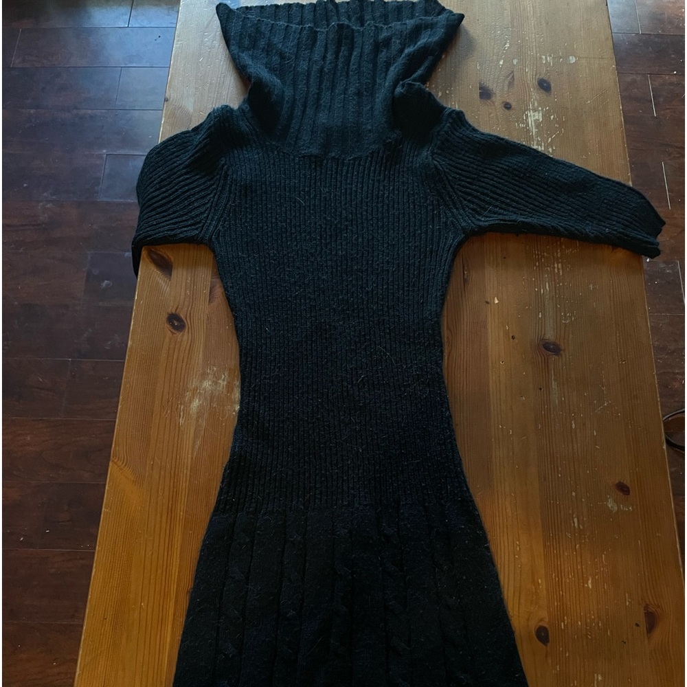 Skinny black sweater dress with loose neck